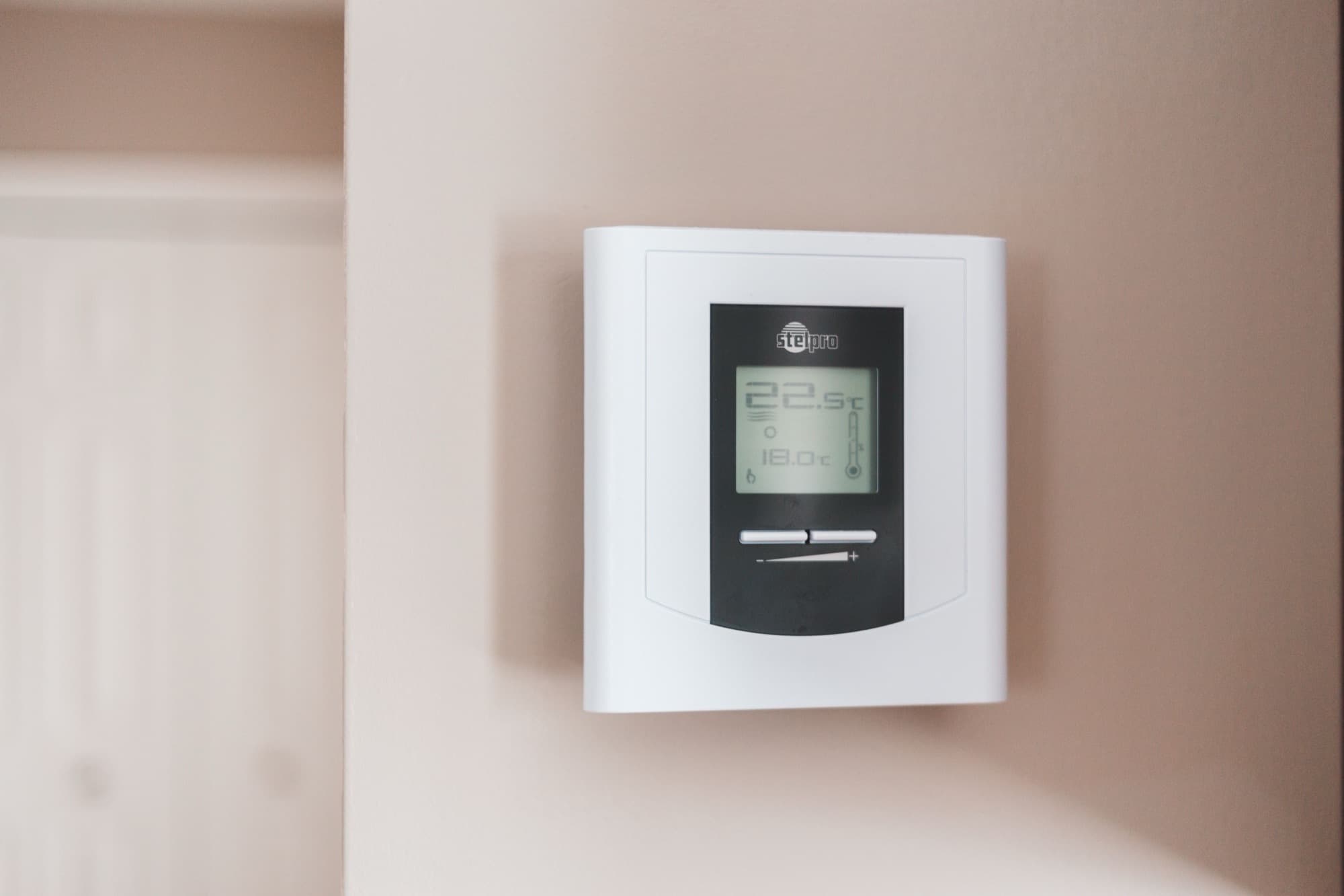 Wall thermostat in a home